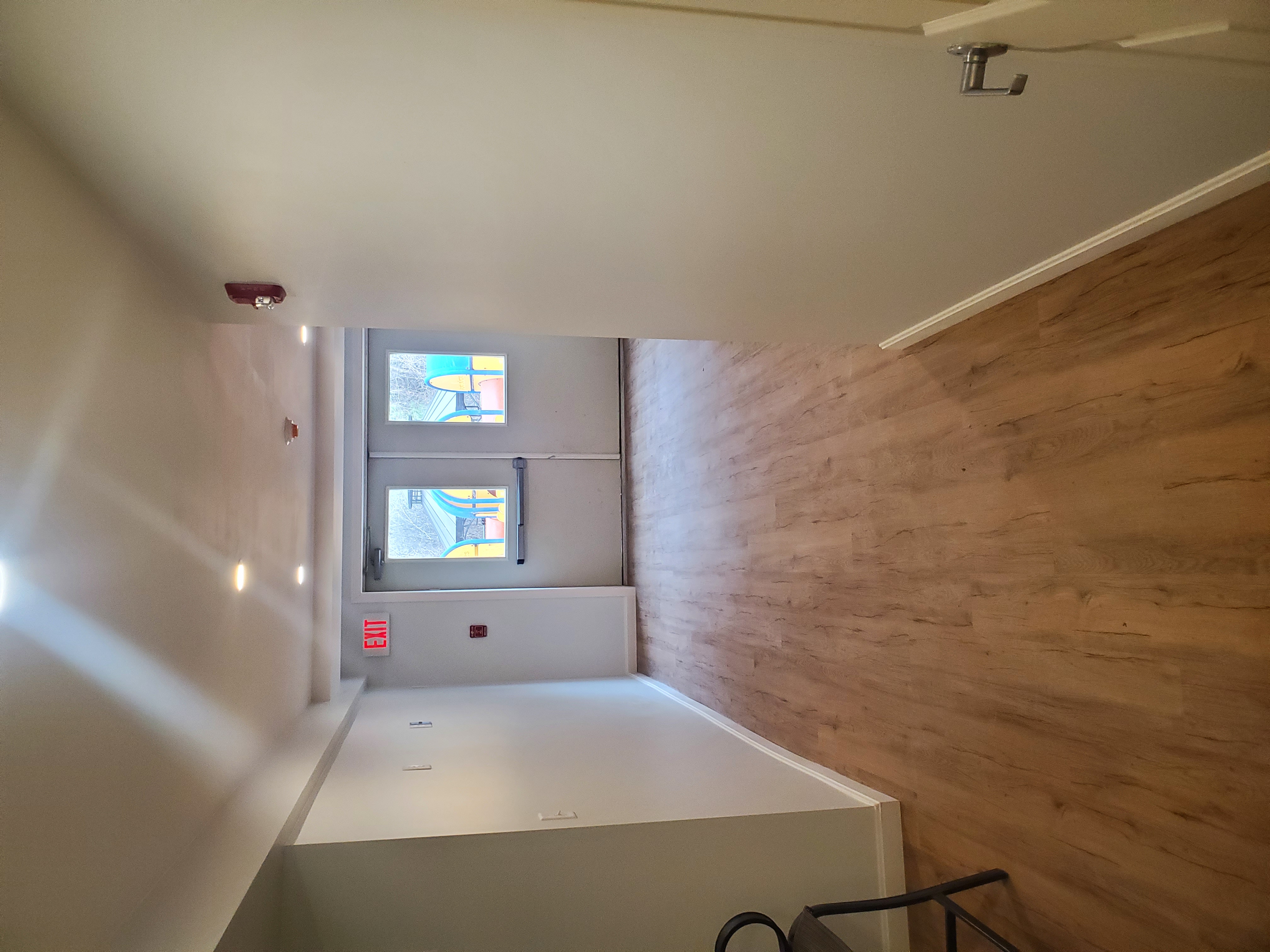 Transformed basement living space with modern finishes and fixtures