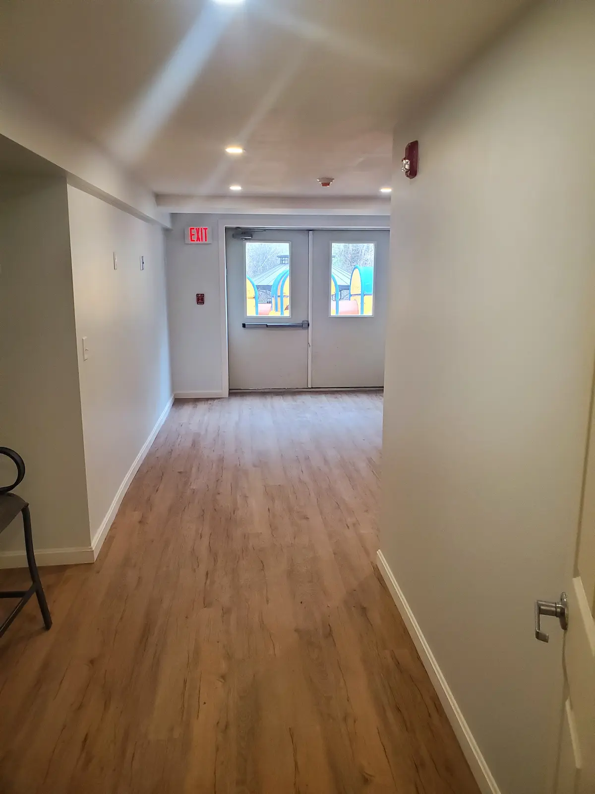 Transformed basement living space with modern finishes and fixtures