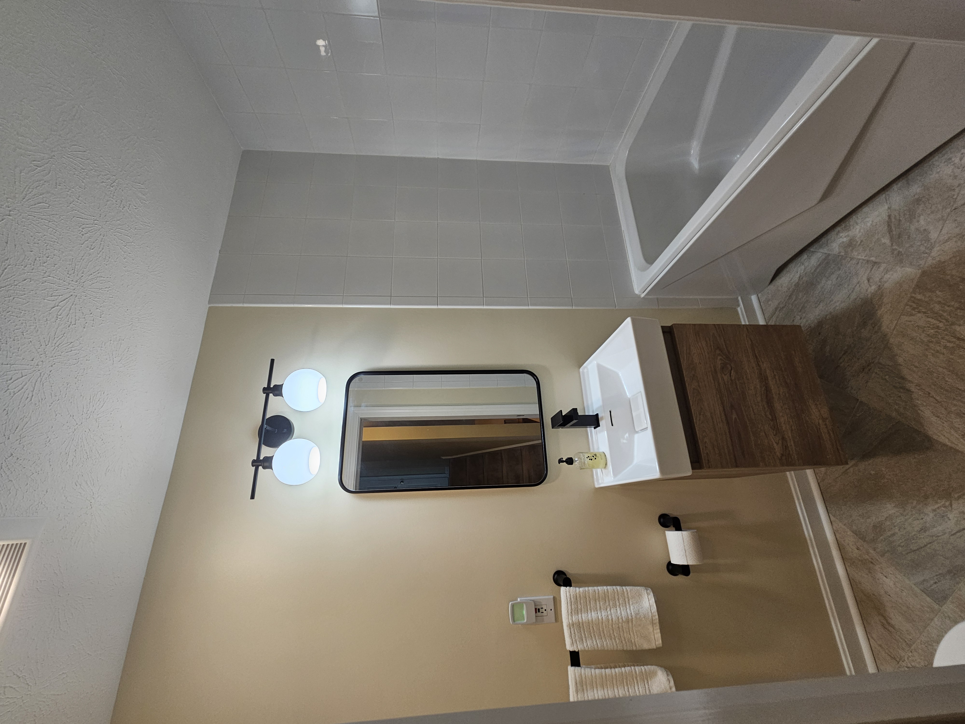 Luxury bathroom remodel with spa-like features and elegant fixtures