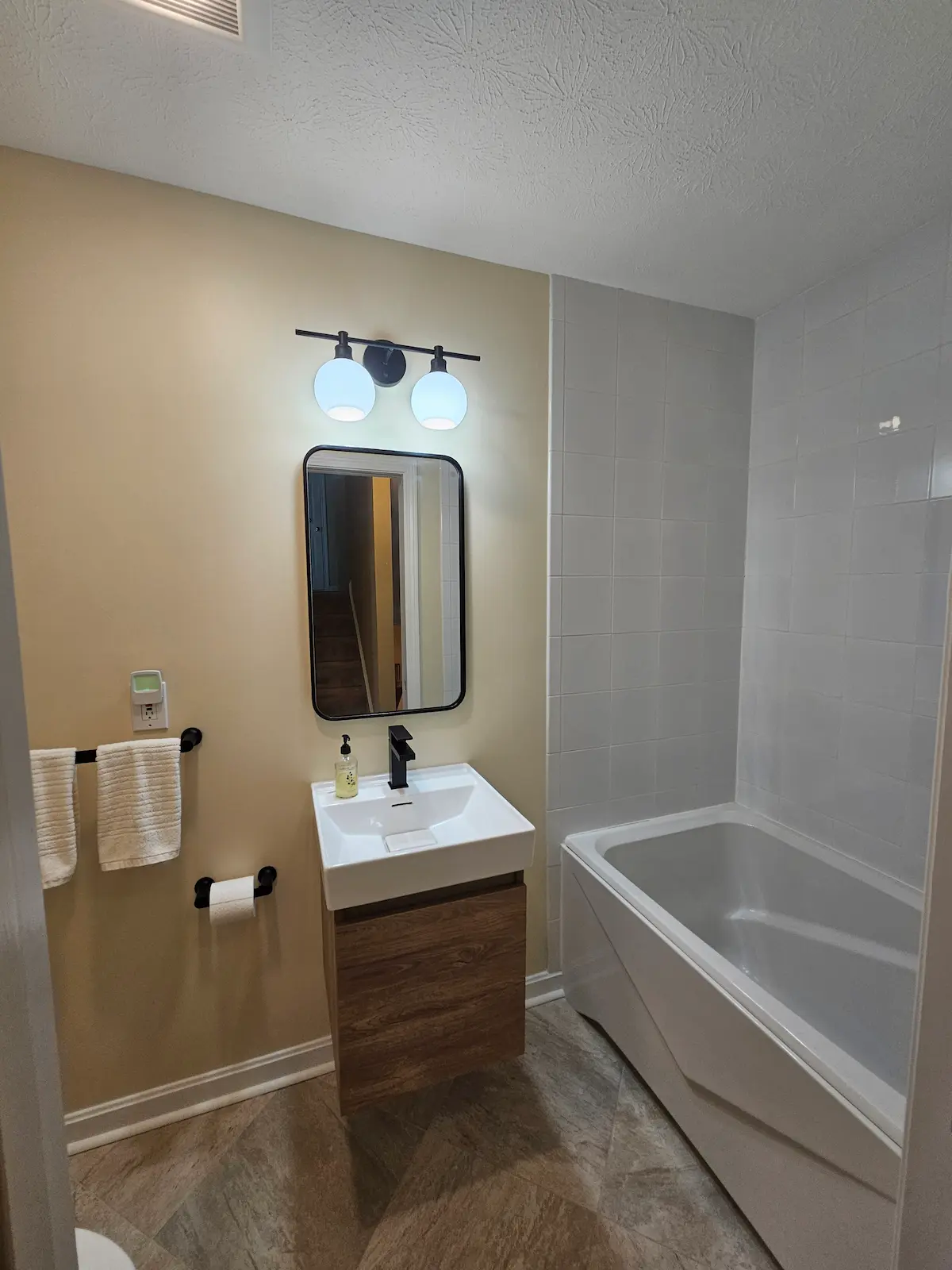 Luxury bathroom remodel with spa-like features and elegant fixtures