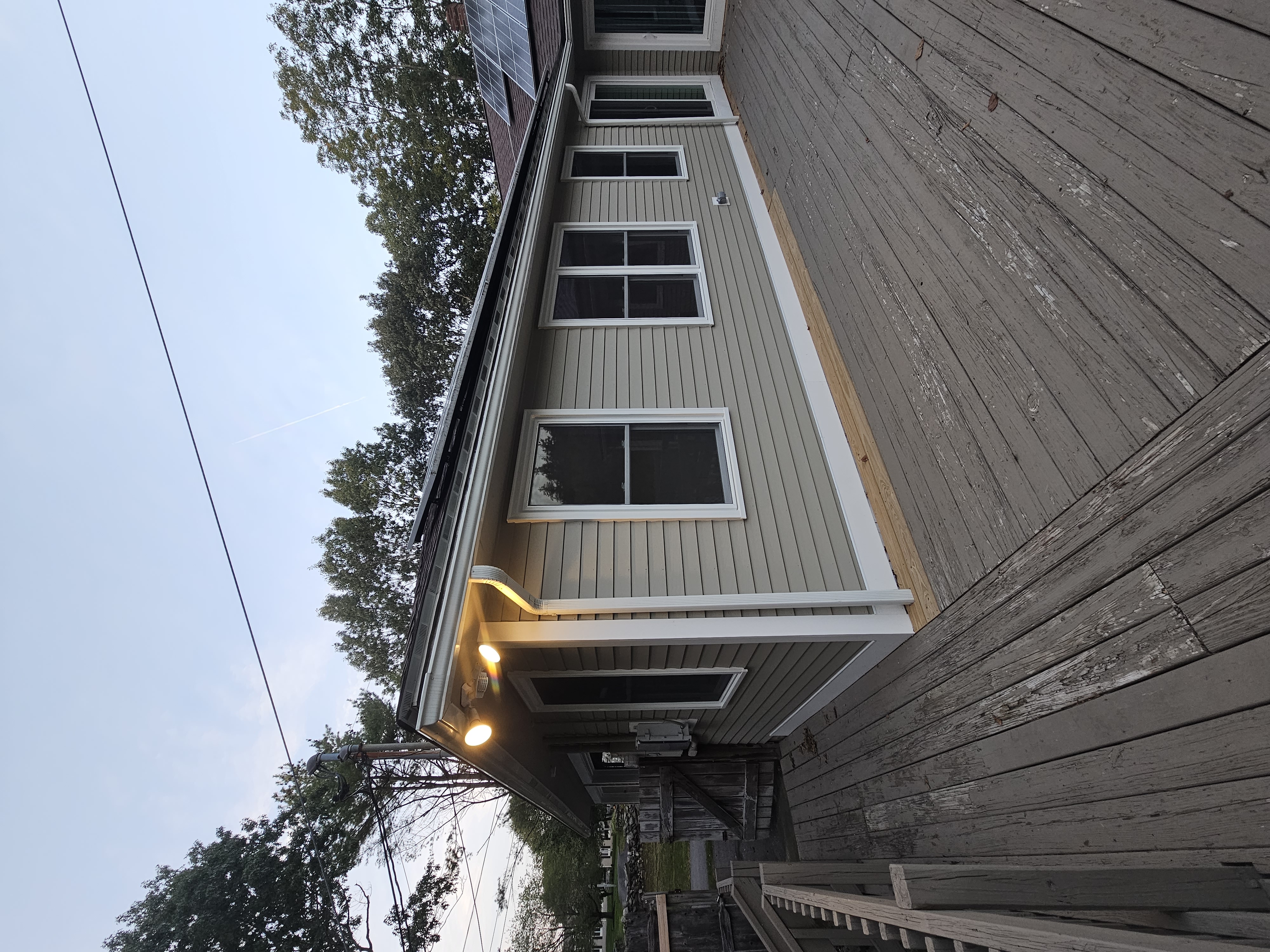 Patio door installation creating seamless indoor-outdoor connection